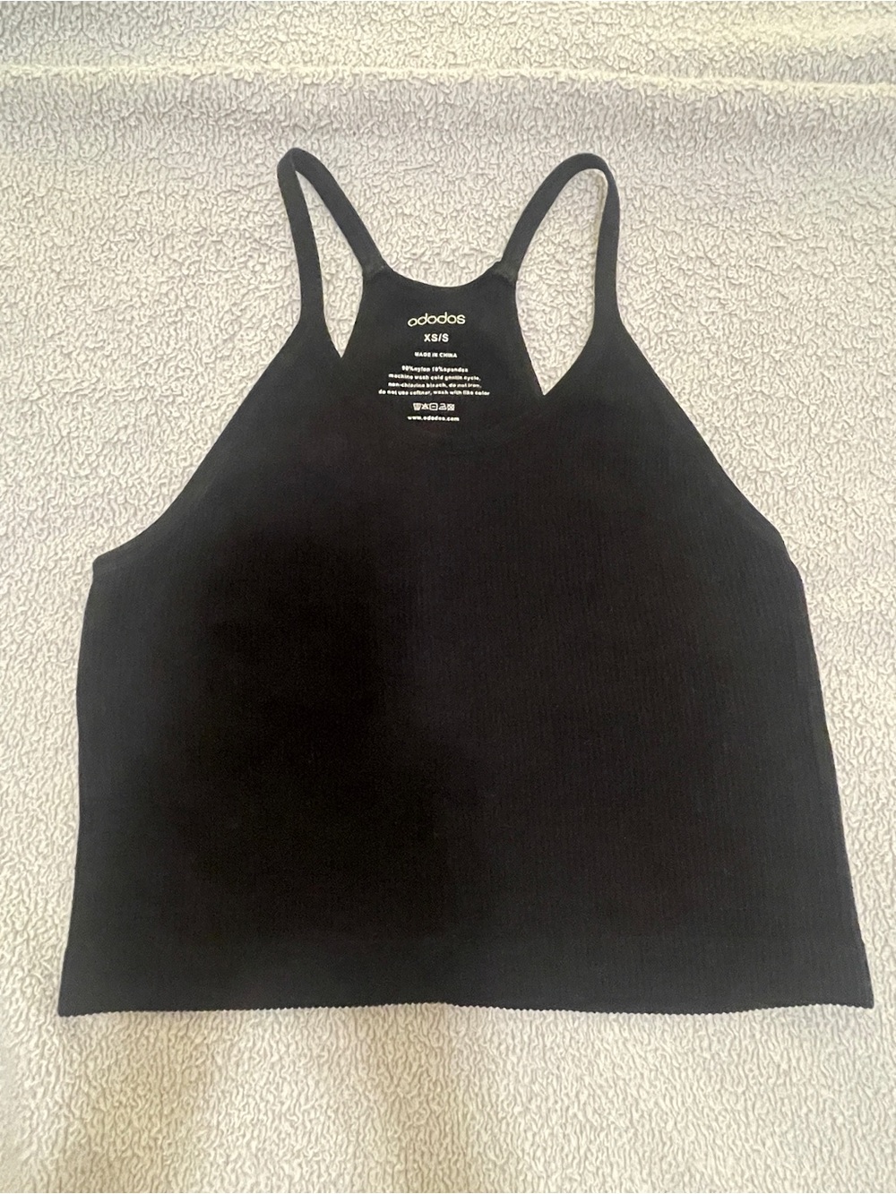 Black Ribbed Racerback Crop Tank by Ododos